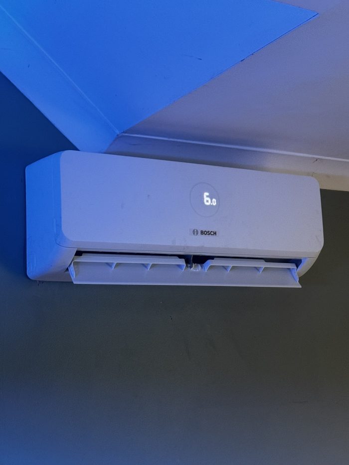 Finished indoor air conditioning unit installed by The Boiler Doctor