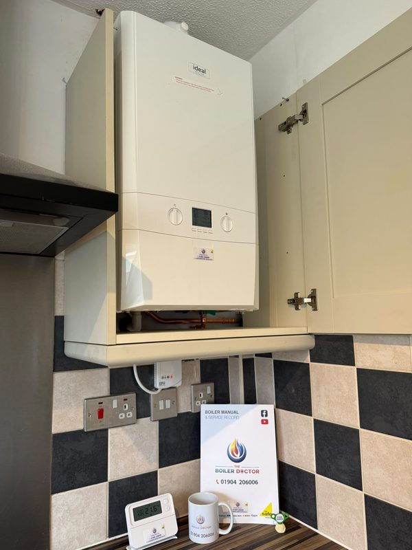 Boiler installed in a bathroom with tiled floor