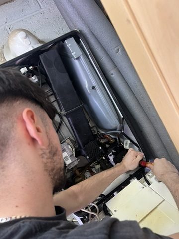 Engineer carrying out a boiler service