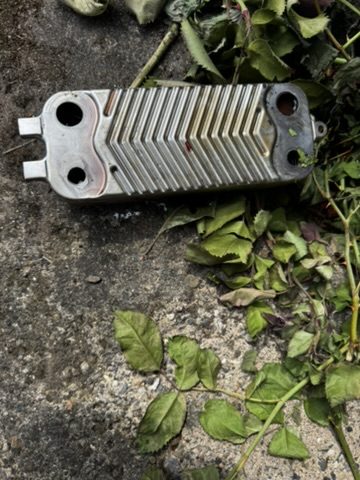 Heat exchanger caked in limescale build-up